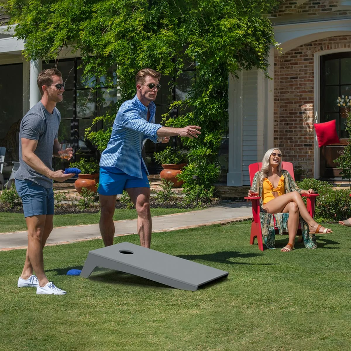 Cornhole game with host at a corporate event